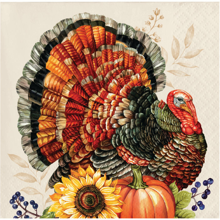 A napkin with an illustration of a large turkey with a fanned tail, surrounded by a sunflower, pumpkins, blue berries, and soft botanical motifs on a light beige background.