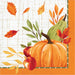 Autumn-themed paper napkin featuring a large orange pumpkin, red apples, green leaves, and orange leaves on a cream grid background with an orange border.