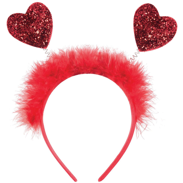 Add some fun glittery flair to your Valentine's Day outfit with our Valentine's Red Glitter Heart Head Bopper! This headpiece will surely make you stand out and spread love with its festive design. Perfect for parties or just showing some love to your special someone.