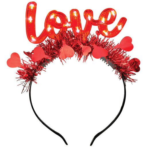 This Valentine's Light Up "Love" Headband features red hearts, tinsel, and the word "LOVE" for a festive and fun accessory. The lights add a special touch, making it perfect for Valentine's Day events and parties. Show your love in style with this light-up headband!