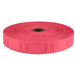 Bright pink roll of perforated tickets with numbered sections visible on the outer surface, wound tightly around a cardboard tube.