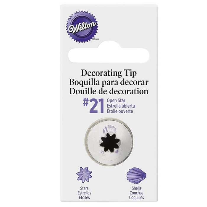 Wilton #21 open star decorating tip in a clear round plastic case with packaging showing examples of stars and shells it can create.