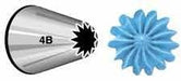 Metal piping tip with sharp star-shaped opening labeled 4B next to a blue frosting sample showing the decorative star pattern it creates.