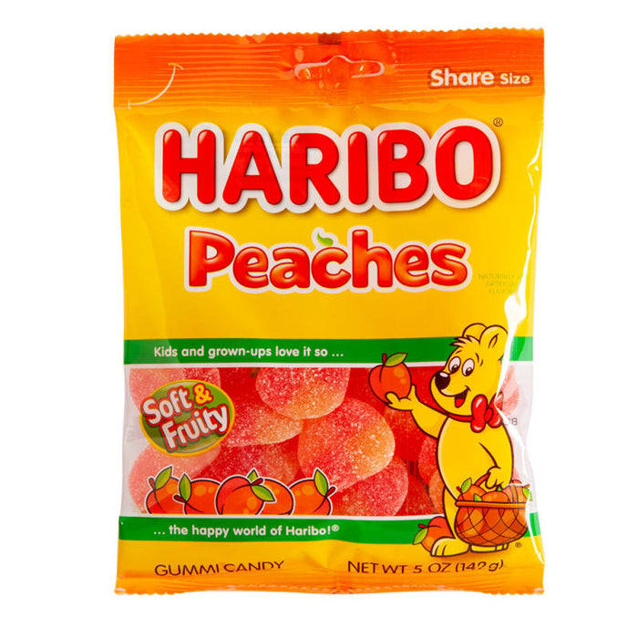 Haribo Peaches Gummi Candy: ring-shaped gummy peaches, orange in color. Sold in a 5 oz clear plastic peg bag that hangs from a printed header card, with the candy visible inside.