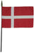 Red flag with a white Nordic cross, mounted on a black stick with a pointed finial.