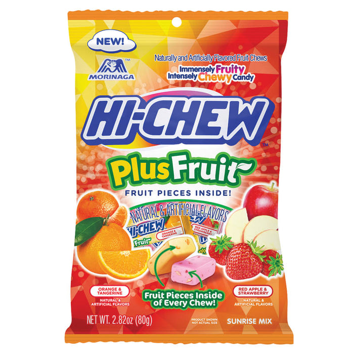 Hi-Chew Plus Fruit: soft chewy fruit candy cubes, in a mix of bright colors. Sold in a 2.82 oz clear plastic peg bag that hangs from a printed header card, with the candy visible inside.