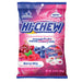 Hi-Chew Berry Mix: soft chewy fruit candy cubes, red and blue in color. Sold in a 3.17 oz clear plastic peg bag that hangs from a printed header card, with the candy visible inside.
