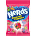 Nerds Clusters: gummy clusters coated in tiny crunchy Nerds. Sold in a 5 oz clear plastic peg bag that hangs from a printed header card, with the candy visible inside.