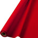 Roll of bright red plastic table covering material with the cardboard tube visible at one end, shown partially unrolled against a white background.