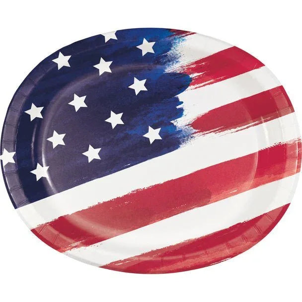 Round dinner plate with American flag design featuring white stars on blue field and red and white stripes with painterly brushstroke effect.
