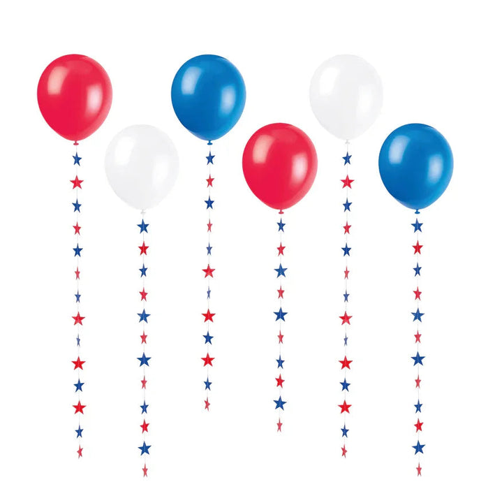 Six large balloons in red, white, and blue with dangling star garland tails in alternating red and blue, creating a patriotic decoration set.
