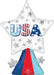 Large star-shaped mylar balloon with "USA" in patriotic red, white, and blue lettering surrounded by gray stars, featuring a blue, red, and light blue striped stand at the base.