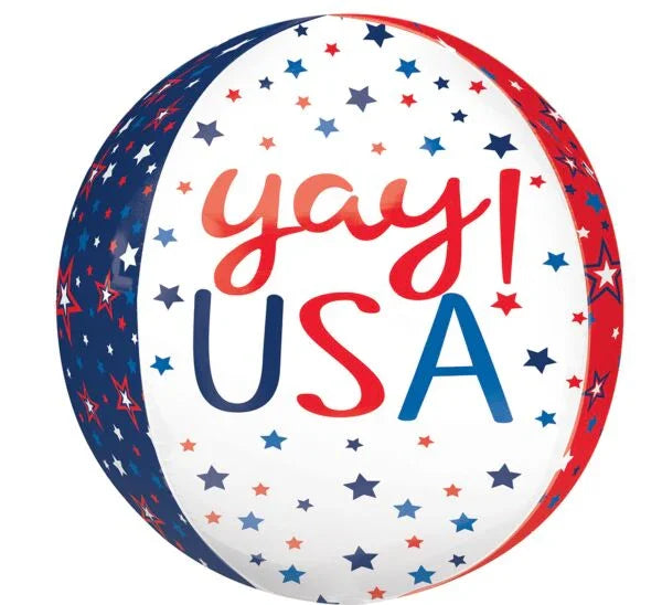Round foil balloon in red, white, and blue with "yay USA" text in the center surrounded by scattered stars in patriotic colors.