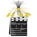 A 3-D table centerpiece featuring a movie clapboard design. Sold as a single piece.