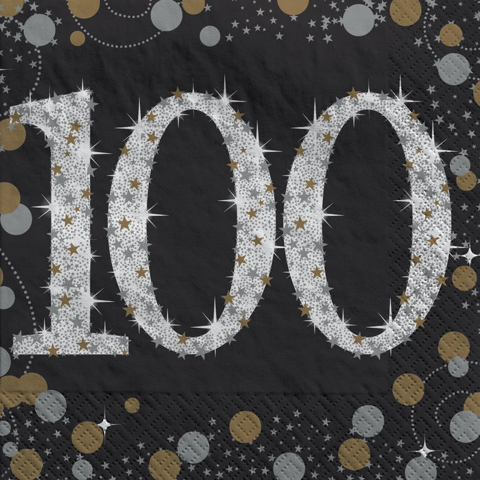 Sparkling Celebration Beverage Napkins Age 100 featuring a black background with a large silver 100, gold stars, sparkles, and gold and silver confetti.