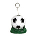 Soccer ball photo holder with black and white paneled design and green grass base, featuring a metal wire loop at top for hanging.