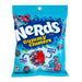 Nerds Clusters Very Berry: gummy clusters coated in tiny crunchy Nerds, red and blue in color. Sold in a 5 oz clear plastic peg bag that hangs from a printed header card, with the candy visible inside.