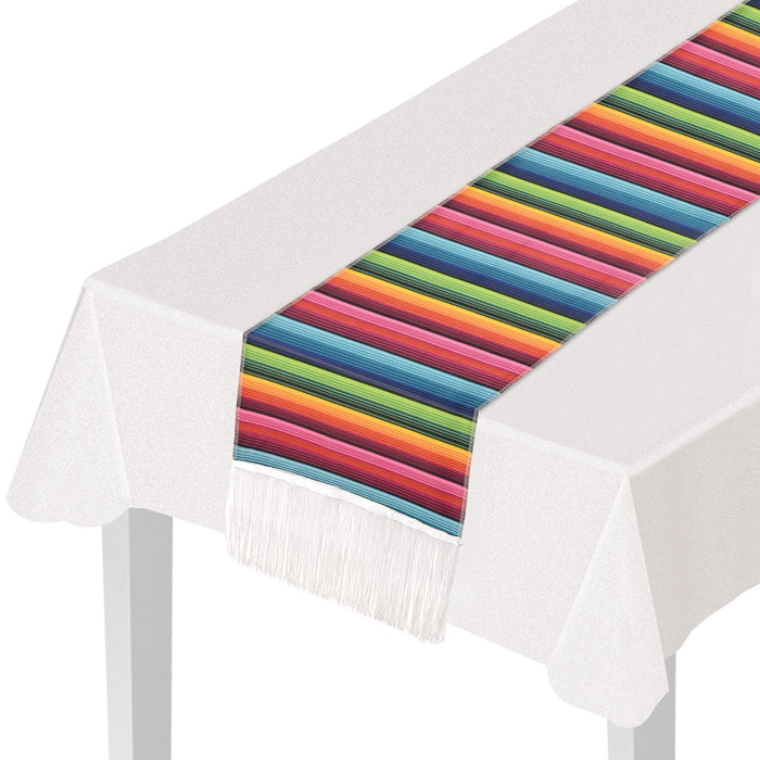 A fabric table runner printed with a fiesta design. Sold as a single piece.