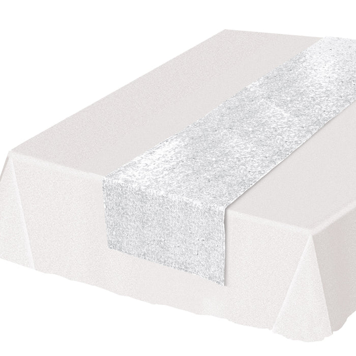 A sequined table runner. Sold as a single piece.