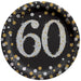 Sparkling Celebration 60 round 7-inch plate with a large silver 60, gold stars, sparkles, and gold and silver confetti on a black background.