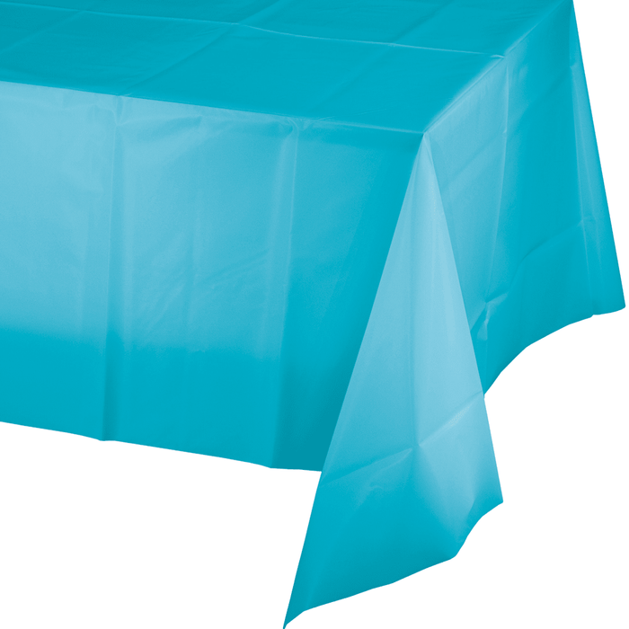 Turquoise plastic tablecloth draped to show its translucent material and rectangular shape, measuring 54 by 108 inches.