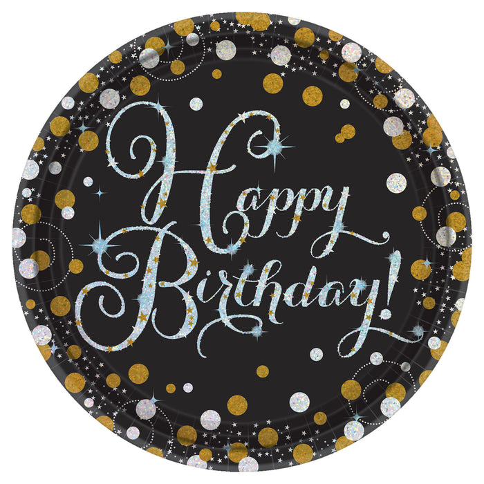 Sparkling Celebration 9-inch paper plate with black background, silver Happy Birthday script, gold and silver dot accents, and star details, sold in an 8-count pack.