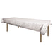 A metallic rectangular table cover printed with a polka dots design. Sold as a single piece.