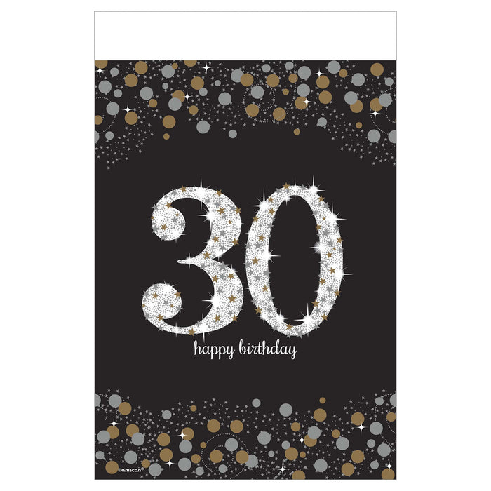 Sparkling Celebration 30 Plastic Table Cover with a large silver 30, happy birthday lettering, and gold and silver confetti on a black background.