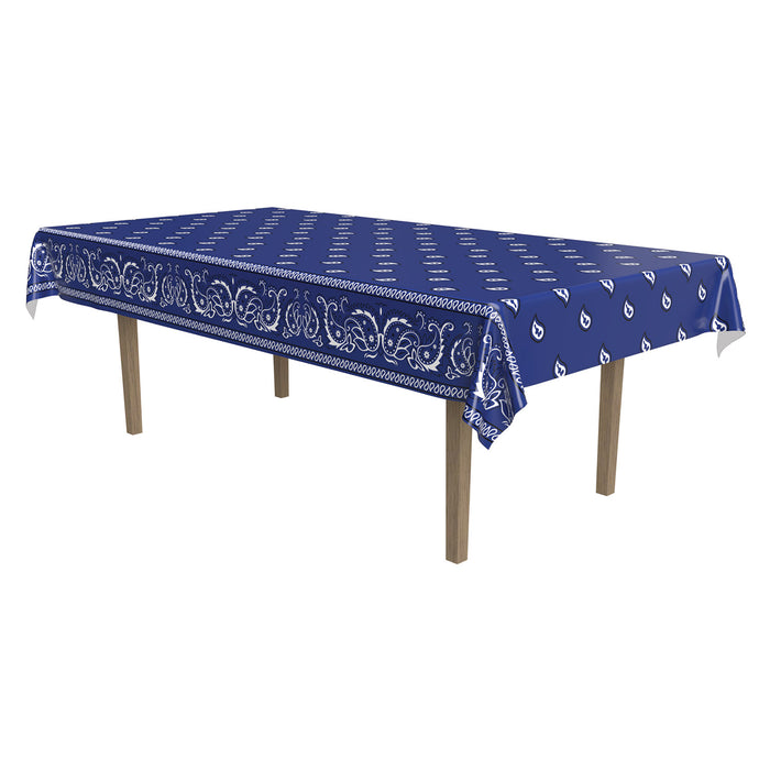 A rectangular table cover printed with a bandana design. Sold as a single piece.