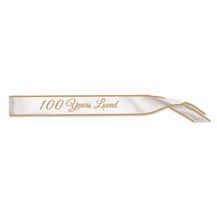 A satin sash worn across the body printed with a 100 years loved design. Sold as a single piece.