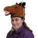  A person wearing a 3d plush horse head hat.