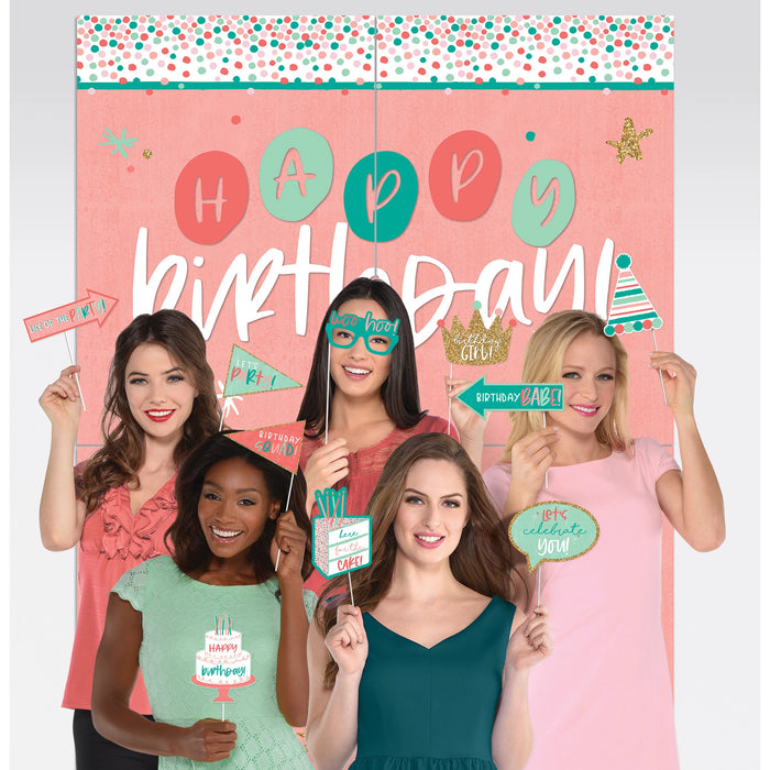 Happy Cake Day Scene Setters With Props featuring a pink happy birthday backdrop and assorted handheld photo props for birthday party pictures.