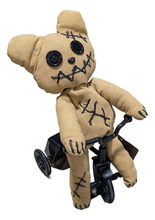 Full-length product photo of the Animated Bear Riding Trcycl, shown against a plain white background — an animated, motion or sound-activated prop. A Halloween decoration.