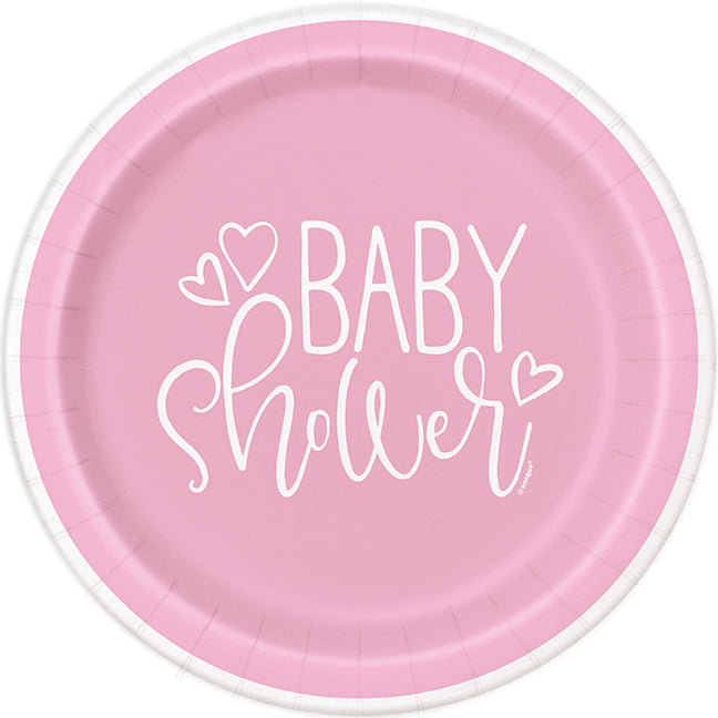 Pink 9-inch baby shower paper plate with white script lettering and heart accents.