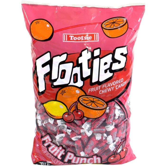 Pink bag of Tootsie Frooties fruit-flavored chewy candy featuring colorful fruit illustrations including oranges, lemons, and cherries, with individual wrapped candies visible through the clear window.