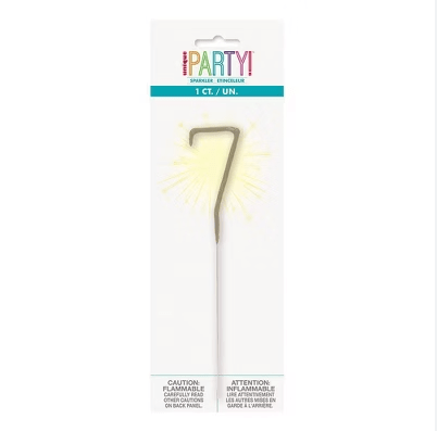 Gold number 7 cake candle with sparkler effects and radiating spikes, displayed on white packaging labeled Party.