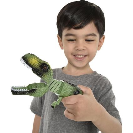 A boy holding a Dinosaur Grabber.