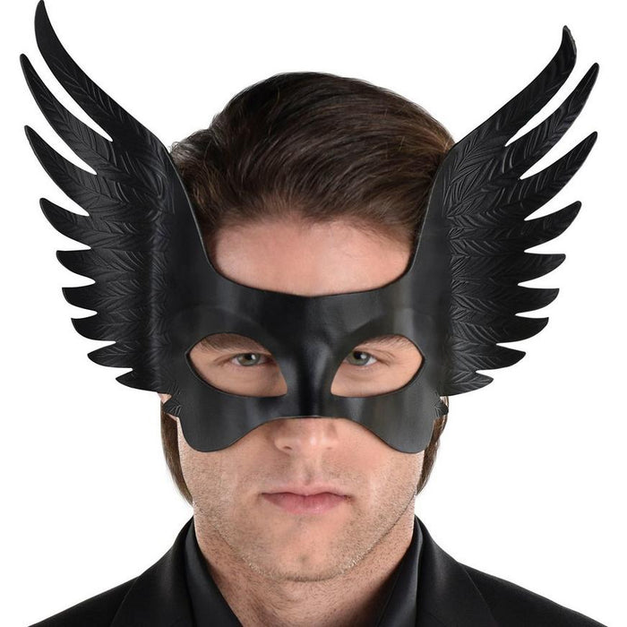 A man wearing a Adult Black Winged Faux Leather Half Mask.