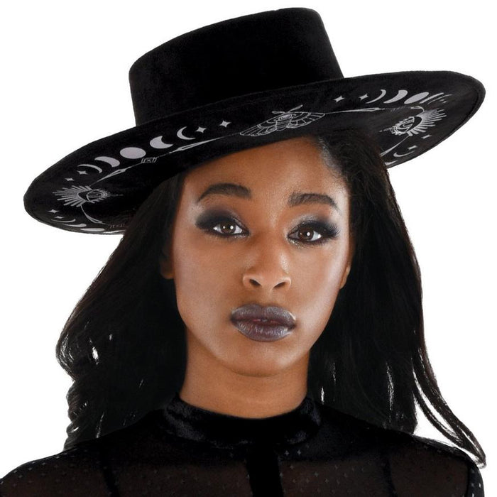 A women wearing a Modern Witch Hat.