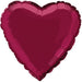 Deep burgundy heart-shaped mylar balloon with a shiny finish and ruffled edges throughout the border.