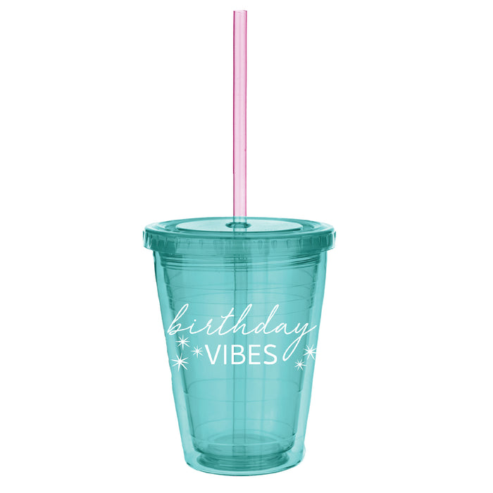 Teal plastic tumbler with lid and pink straw featuring birthday VIBES text printed on the front.