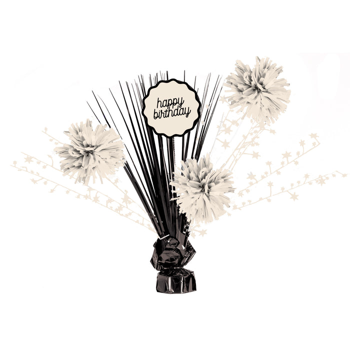 Birthday Chic Birthday Centerpiece with black and cream pom-poms, star accents, striped sticks, and a happy birthday sign topper on a weighted base.