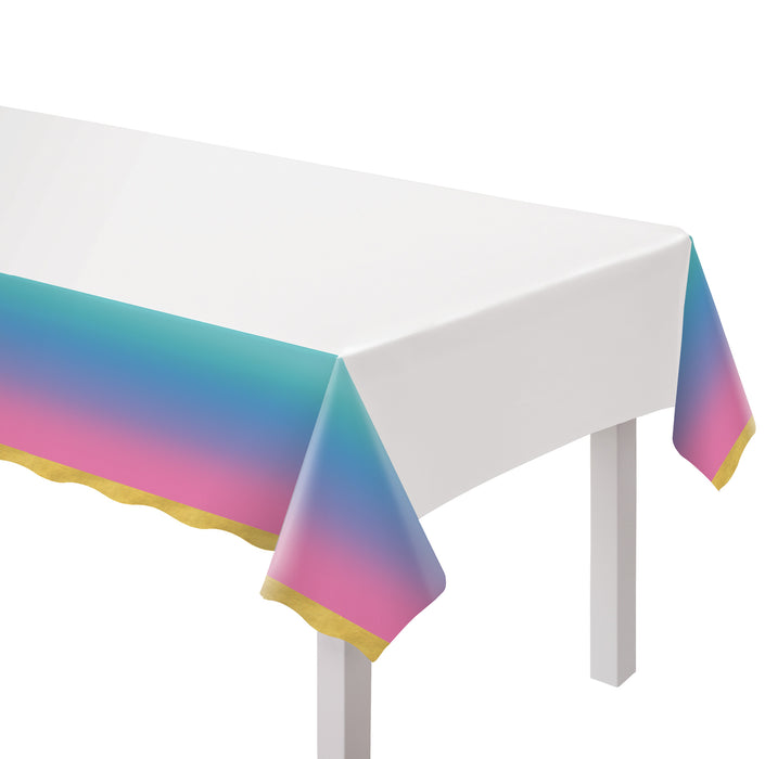 Digital Dream Plastic Table Cover with a white center and teal, blue, purple, and pink ombre border finished with gold scalloped accents.