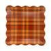 Plaid patterned paper plate on a white background