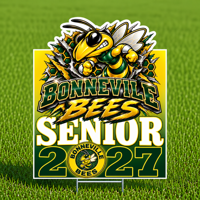 A Bonneville Bees senior 2027 yard sign displayed on a green grass field. The sign features a cartoon bee mascot, the text 'Bonneville BEES SENIOR 2027', and a circular logo on a yellow and green background.