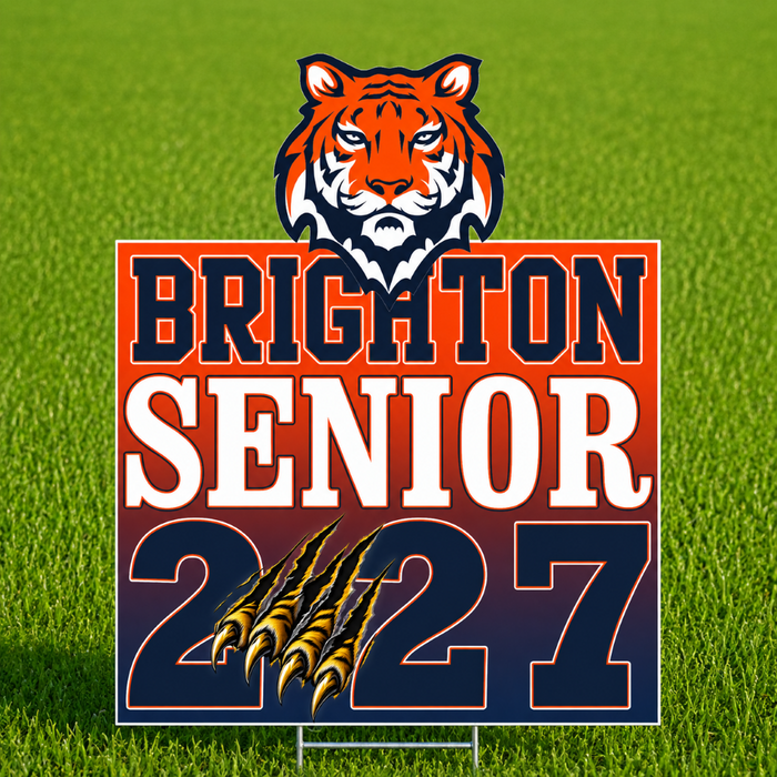 A custom yard sign featuring a tiger mascot above the text 'BRIGHTON SENIOR 2027' in navy and white, displayed on a green grass background.