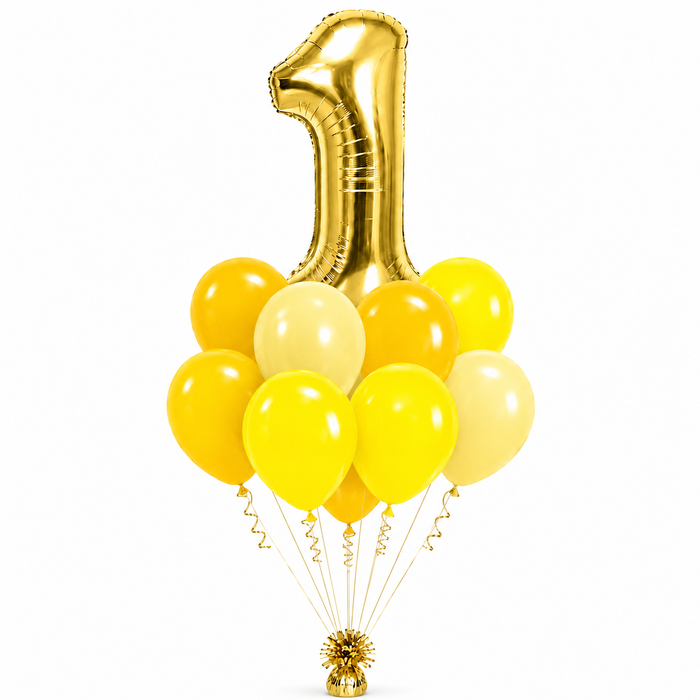 A first birthday balloon bouquet featuring a large metallic gold foil number '1' balloon, surrounded by a cluster of yellow and pale yellow latex balloons tied to a gold finial at the bottom, on a plain white background.