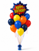 Superhero Happy Birthday balloon bouquet with comic-style burst balloon and red, orange, yellow, blue, and navy balloons.