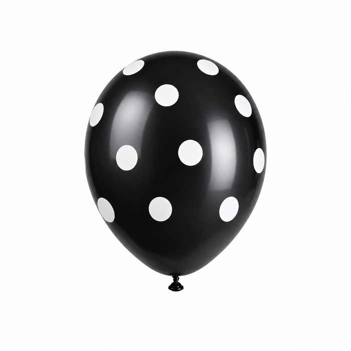 Midnight black latex balloon with large white polka dots on a white background.