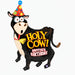 Black foil balloon shaped like a cartoon cow wearing a colorful polka-dot party hat and red bow tie, with "HOLY COW! ANOTHER BIRTHDAY" printed in yellow and white text on its body.